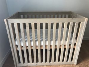 Babybed zijkant