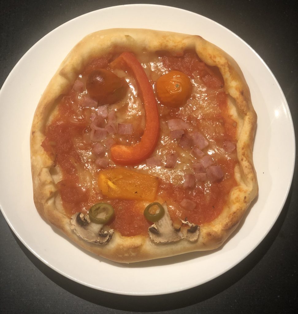 Pizza gezicht smakelijk